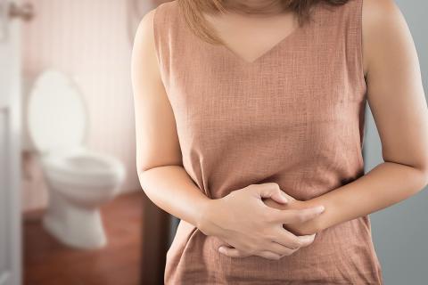 Woman suffering from functional bowel disorder
